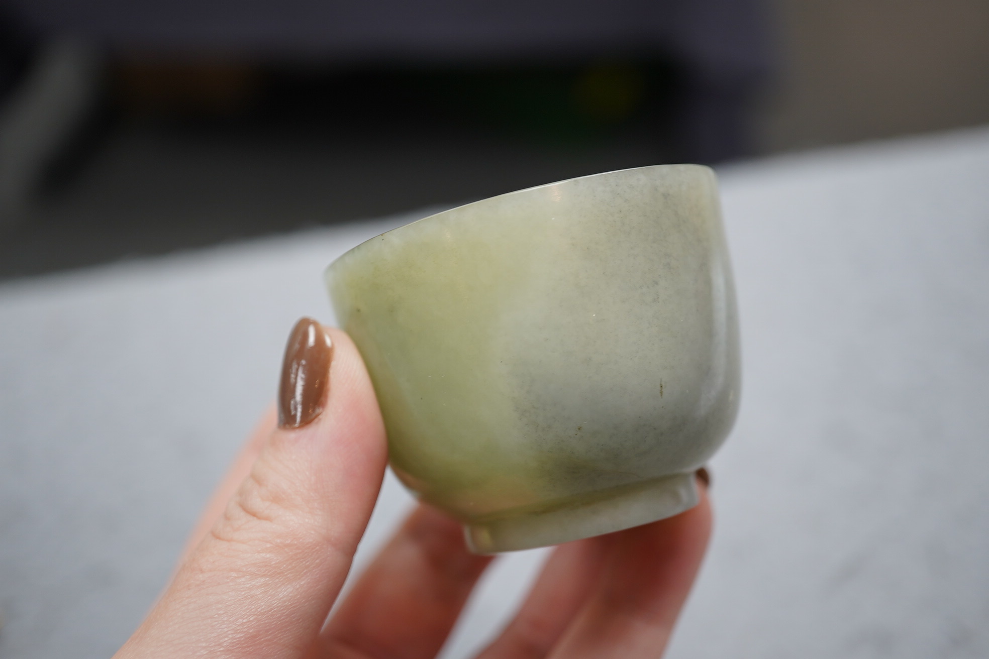 A Chinese pale celadon jade cup, 18th / 19th century